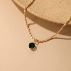 Golden green zirconium