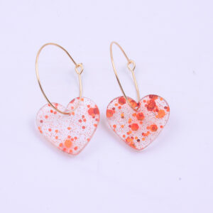 A pair of red sequined love earrings