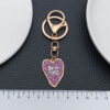 O1CN014FwfVv2Kpbd2UkPSL_2217654629606-0-cib Wholesale Purple printed big heart Valentine's Day alloy 8-shaped keychain