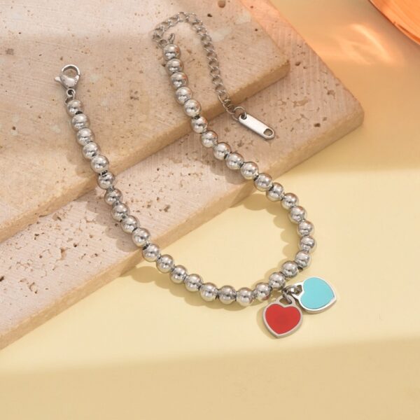 O1CN014xIIAC1MqBCdKIocP_2212889381485-0-cib Wholesale Stainless Steel Powder Blue Double Heart Bracelet