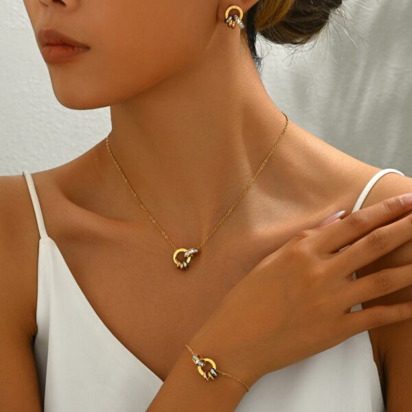 Wholesale Stainless steel gold double-ring linked artificial zircon necklace, bracelet, and earrings
