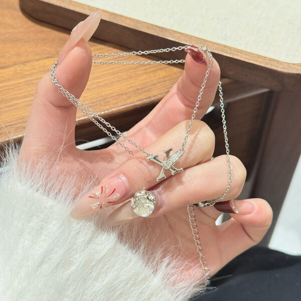 Wholesale 26 letter titanium steel necklace with diamonds