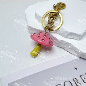Pink with green mushrooms (gilt hardware)
