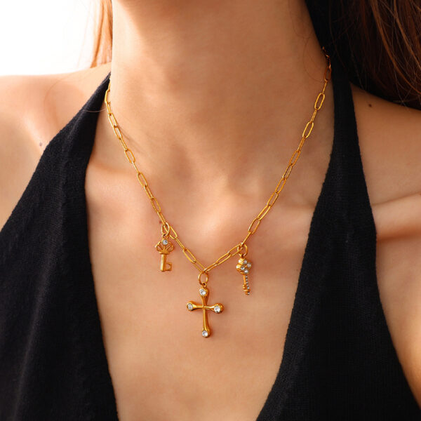Wholesale Stainless steel gold-colored diamond-studded key cross pendant