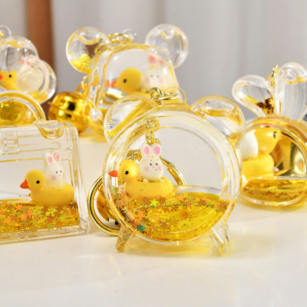 Wholesale Acrylic rabbit oil flow sand bottle keychain