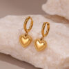 Wholesale Heart-shaped diamond-encrusted stainless steel earrings with plating