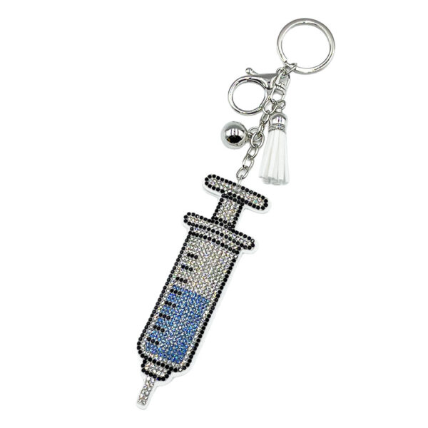 Wholesale Diamond-studded syringe keychain fashionable tassel pendant