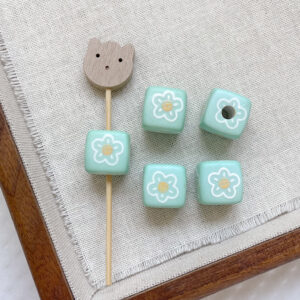 11 # Mint green and white five-petal flower (one)