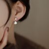 O1CN0162LpH61W1vrAWTReD_2218534612729-0-cib Wholesale pearl earrings niche fashion simple earrings