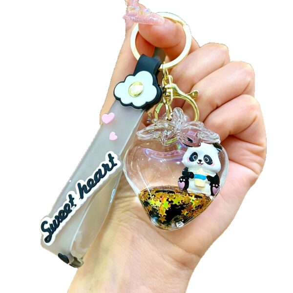 Wholesale Black gold floating cartoon cute panda keychain