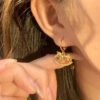 Wholesale Golden crushed ice rocking horse earrings
