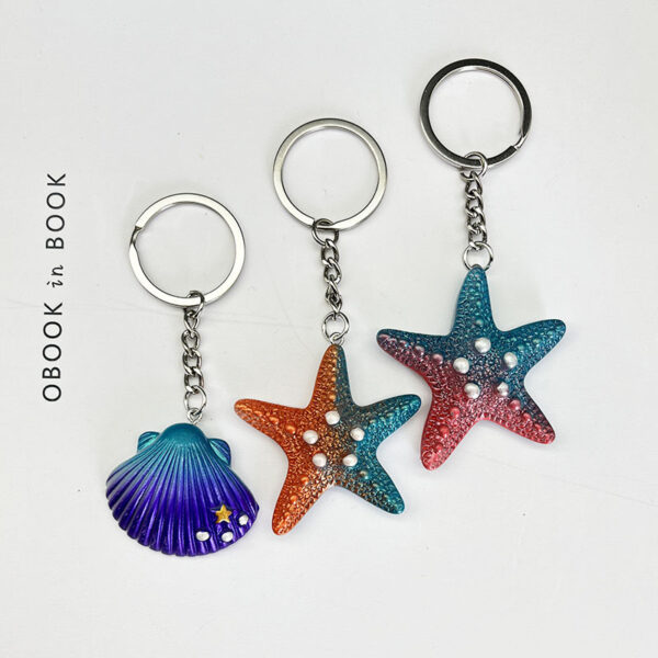 O1CN0172zLEa1TDR1FMMcWN_2219145822348-0-cib Wholesale Colorful Ocean Star Shell Metal Keychain