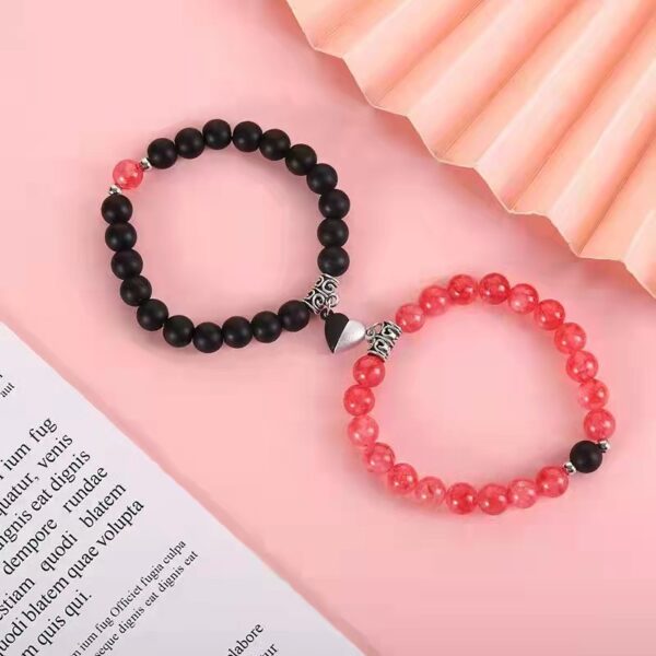 Wholesale Couple bracelet with crystal elastic cord, geometric magnetic clasp, and beaded design.