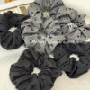 Wholesale Black polka dot bow with heart-shaped elastic headband