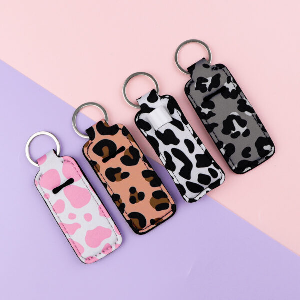 O1CN017aa8Bc1ePlQfHWPCY_2217094333864-0-cib Wholesale Leopard Lipstick Set Keychain Accessories