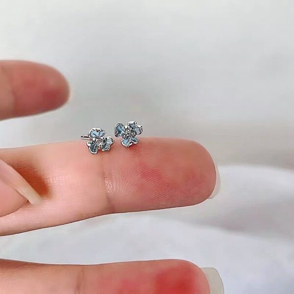 Wholesale Female wearing two rear hanging star and moon earrings