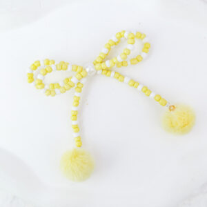 Yellow double layer rice beads fur ball bow