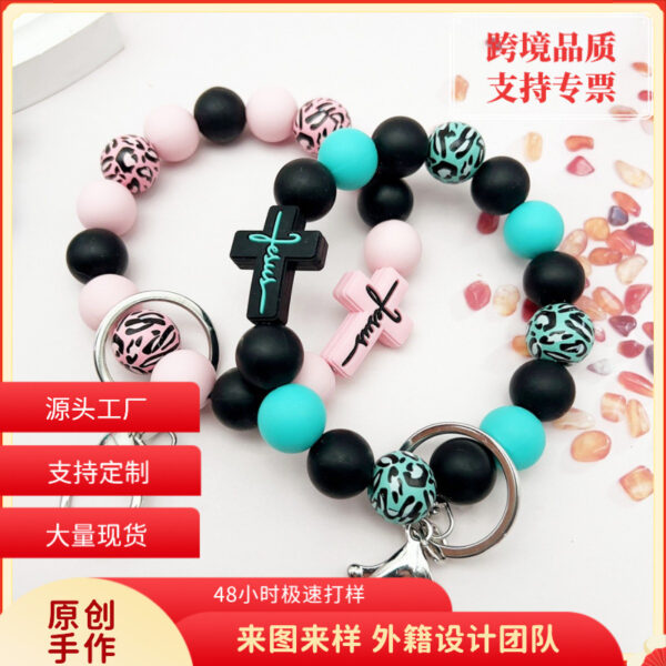Wholesale Cross Silicone Leopard Beaded Wrist Keychain Bag Austrian Pendant