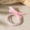 O1CN018hYHDR1ZBV0ZkY9Ng_2925713156-0-cib Wholesale Bow colored pearl multi-layer layered bracelet