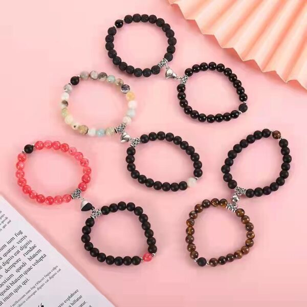 Wholesale Couple bracelet with crystal elastic cord, geometric magnetic clasp, and beaded design.