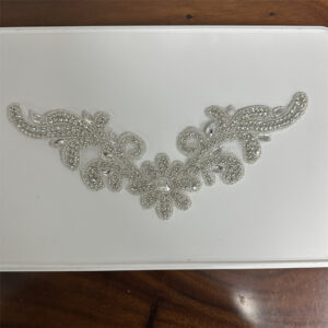 Silver v-neck flower