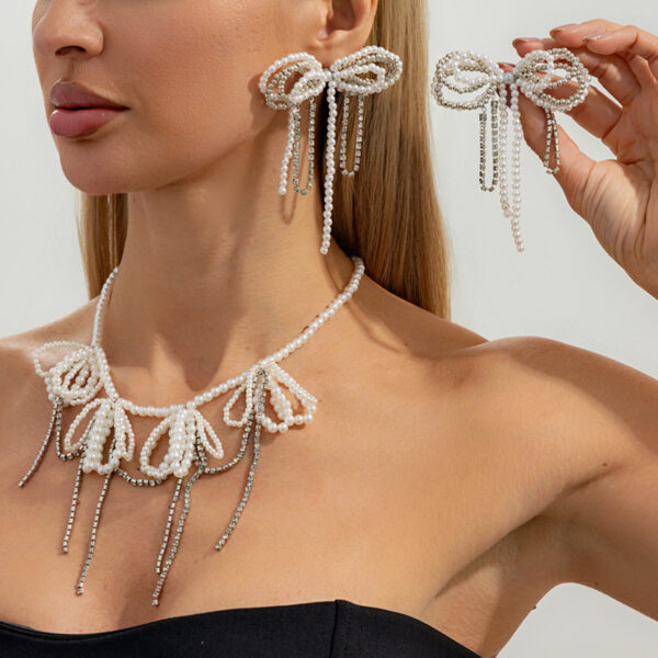 Wholesale Pearl bowknot diamond-encrusted chain tassel necklace