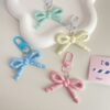 Wholesale spring and summer candy-colored hollow butterfly bow keychain