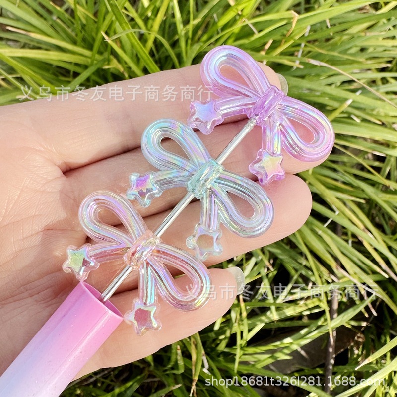 Wholesale 34mm transparent rainbow color plated star bow acrylic beads
