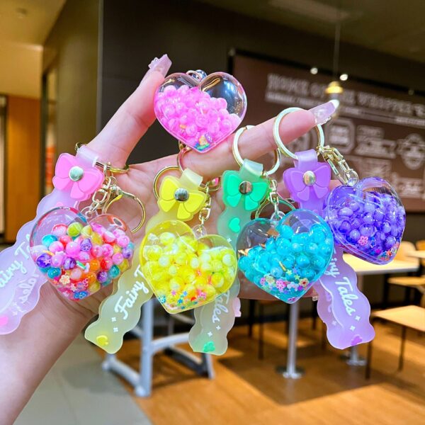 Wholesale Creative Summer Colorful Sand Heart Glow-in-the-Dark Keychain
