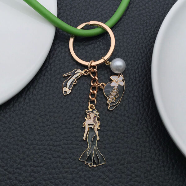 O1CN01AVBVjw2Kpbd3YFa81_2217654629606-0-cib Wholesale Cross-border oil-dripping black princess dress model small fragrant style hat high heels keychain exquisite jewelry key chain