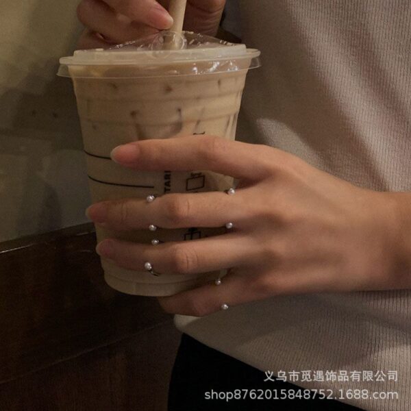 O1CN01AcN5yN1k0vj8T2JrO_2221230424622-0-cib Wholesale Minimalist pearl knuckle ring, niche and sophisticated, fashionable and unique, featuring a combination of beads for layering and a cool, understated style.