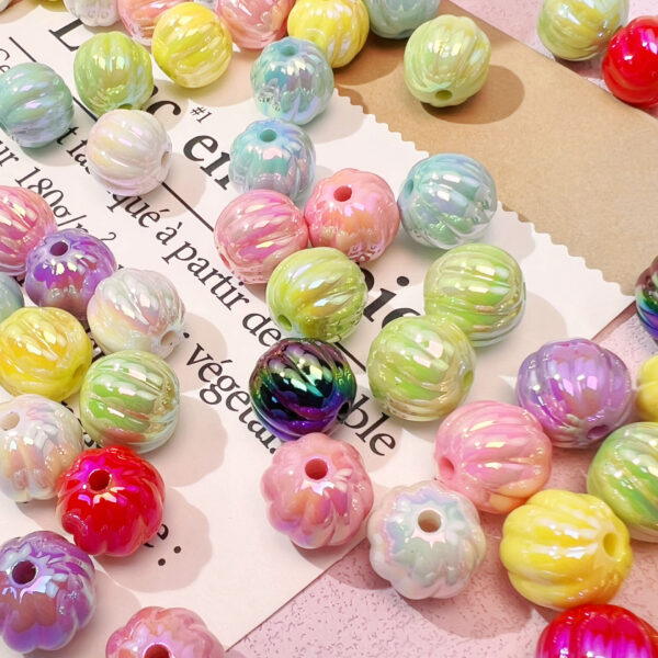 O1CN01AhxzFi2N5kgyVA7iY_2216430329912-0-cib Wholesale 14mm Asymmetrical Resin Pumpkin Beads