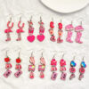 O1CN01AnUFWs1ZtvJn47etw_3833523253-0-cib Wholesale Valentine's Day pink heart-shaped rose fringed earrings