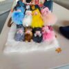 O1CN01B9SWdY1sc2chXfSur_0-cbu_common_content Wholesale Cute Fur Sping Doll Keychain