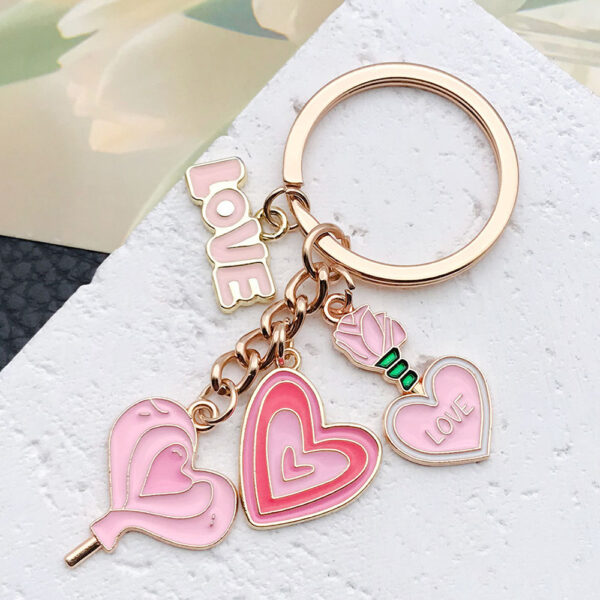 Wholesale Cute Pink Love Rose Potion Keychain