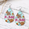 O1CN01BGlKNE1ZzQHXZNs5f_2214986983265-0-cib Wholesale Nurse's Day western style leopard print sunflower leather pendant earrings