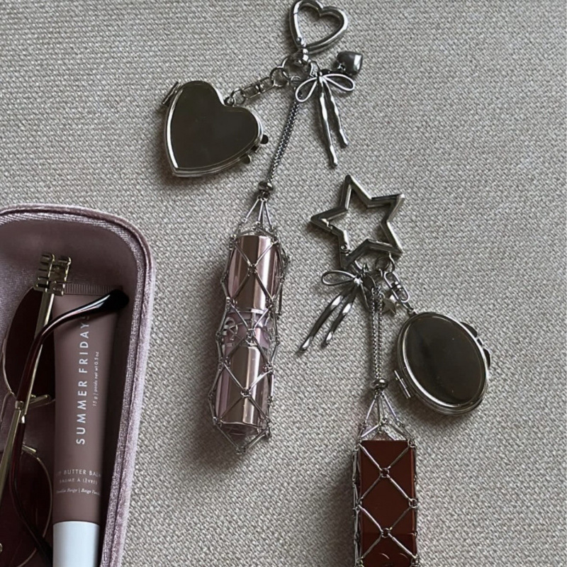 Wholesale Sier mesh bag with hand cream lipstick pull-out bag hanging chain