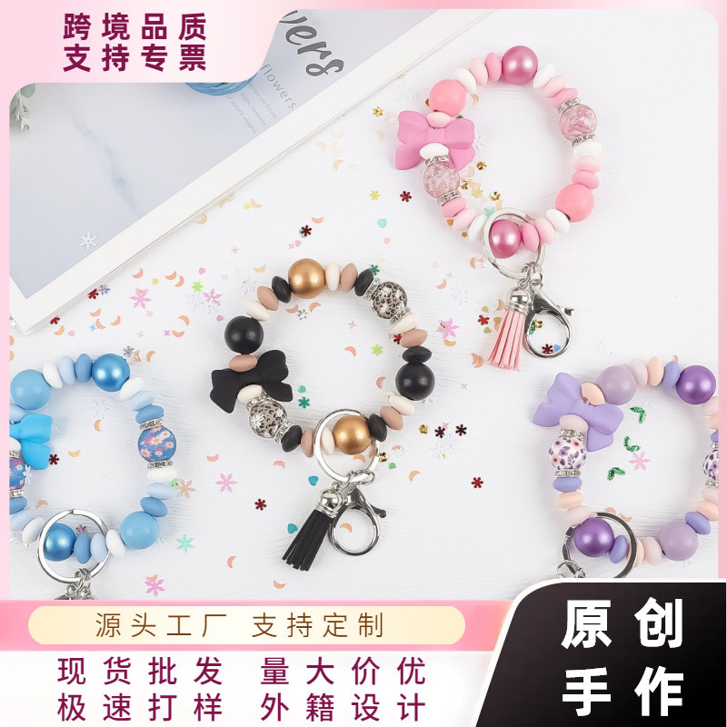 Wholesale silicone bead keychain pendant bag charm bow aessory