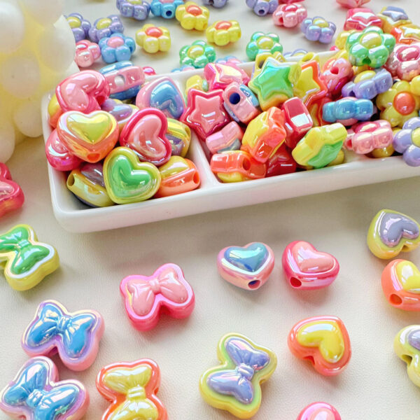 O1CN01BnVnKQ2N5kl4CcBUl_2216430329912-0-cib Wholesale Color matching five-inted star flower love resin beads