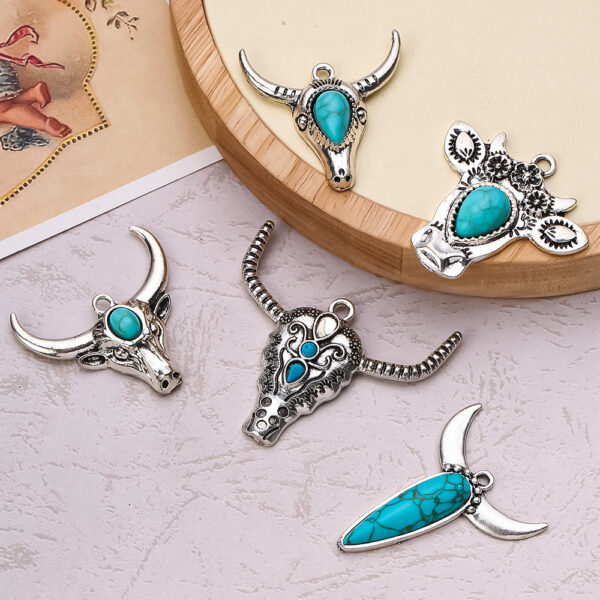 O1CN01ByljVt267GjN9sWwy_2215756907614-0-cib Wholesale Bohemian style turquoise diverse bull pendant