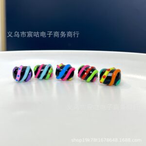 Wholesale Black barrel bead, glassy rainbow striped beads