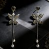 Wholesale Copper Inlaid Zircon Butterfly Pearl Tassel Earrings