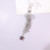 Wholesale Bow five pointed star tassel metal keychain