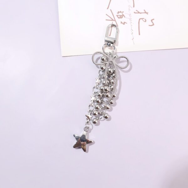 Wholesale Bow five pointed star tassel metal keychain