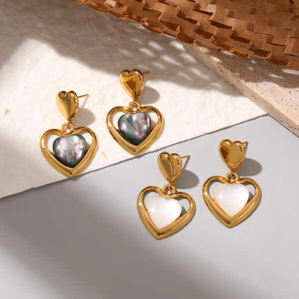 Wholesale Stainless steel heart earrings for women inlaid with cat's eye stone
