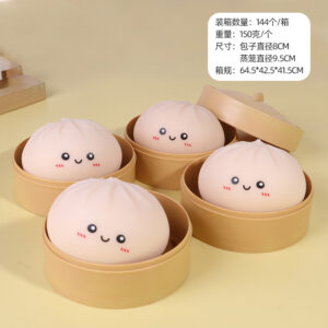 White emoji-shaped steamed buns + steamer