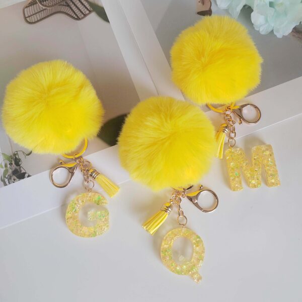Wholesale Yellow letter ball pendant flower shaped letter keychain