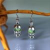 Wholesale Halloween smooth hollow skeleton luminous ghost head earrings