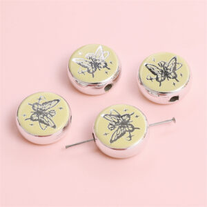 Flat disc-butterfly rose 18mm aperture about 2.5mm yellow / 2/bag
