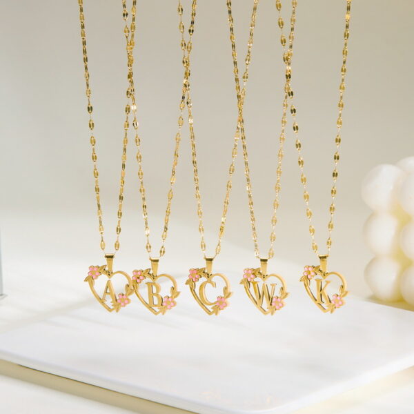 Wholesale 26 letter heart-shaped flower hollow stainless steel necklace